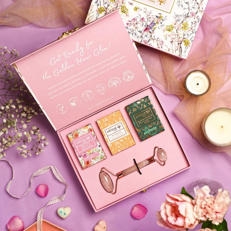 natural vibes glow getter gift set with rose quartz face roller vitamin c serum nirvana flower oil and gold beauty elixir oil 2