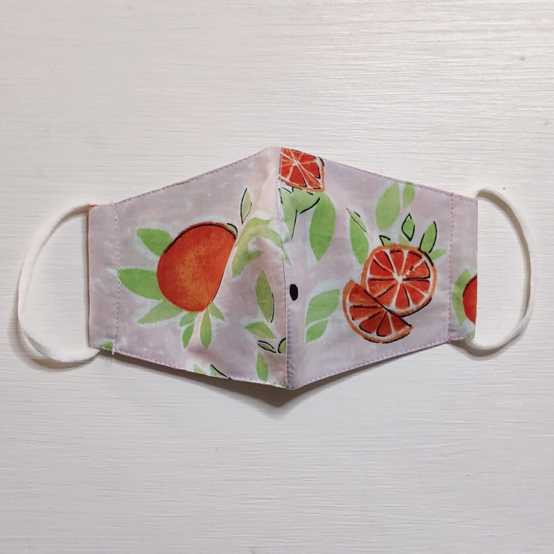 100 cotton mask 3 layers of cotton to keep them breathable for the children as well as offering protection just peachy mask